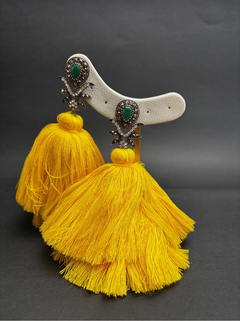 Bold Yellow Tassel Statement Earrings with Green Gem Accent